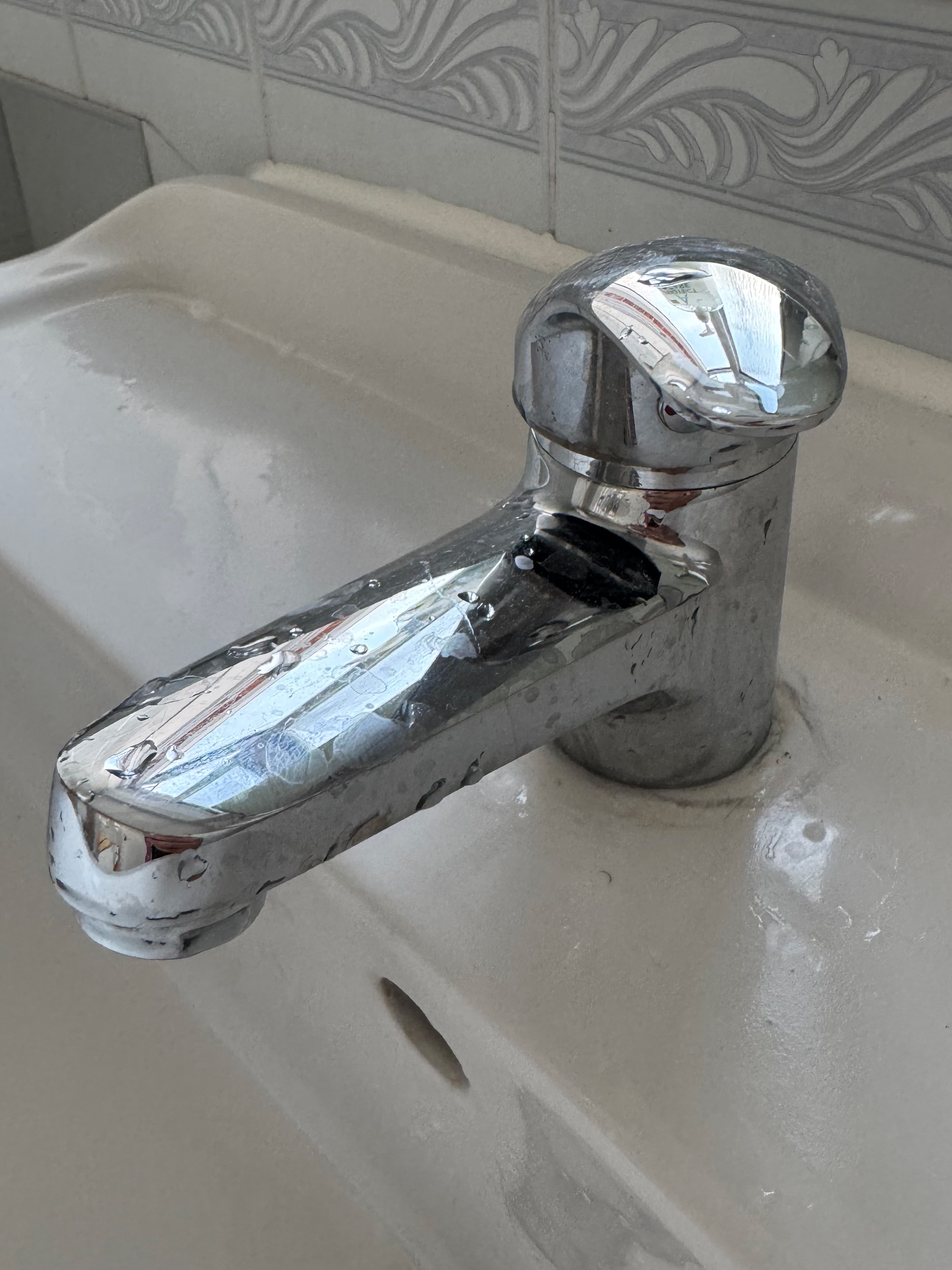 Bathroom Tap before cleaning